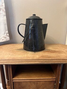 Vintage speckled enamelware pitcher